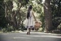 Sad girl hugging teddy bear sadness alone in green garden park. Lonely girl feeling sad unhappy walking outdoors with best friend Royalty Free Stock Photo