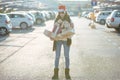 Sad girl with a lot of boxes and santa`s red hat spent too much money for xmas presents Royalty Free Stock Photo