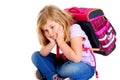 Sad girl with schoolbag Royalty Free Stock Photo