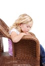 Sad girl sitting in chair Royalty Free Stock Photo
