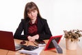 Sad girl sitting at office desk Royalty Free Stock Photo