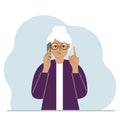 Sad grandmother talking on a cell phone with emotions. One hand with the phone the other with a forefinger up gesture.