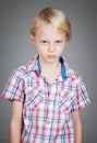 Sad grumpy young boy Royalty Free Stock Photo