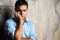 Sad guy against wall Royalty Free Stock Photo