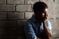 Sad guy against wall Royalty Free Stock Photo