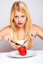 Sad healthy woman with red pepper