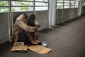 Sad Homeless old man in city Royalty Free Stock Photo