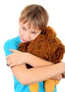 Sad Kid with a Plush Toy Royalty Free Stock Photo