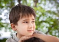 Sad little boy looking at something Royalty Free Stock Photo