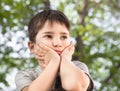 Sad little boy looking at something Royalty Free Stock Photo