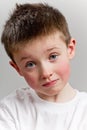 Sad little boy looking to camera Royalty Free Stock Photo