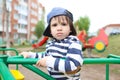 Sad little boy on playground Royalty Free Stock Photo