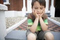 Sad Little Boy Sitting On Front Steps Royalty Free Stock Photo