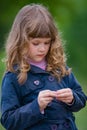 Sad little girl portrait outdoors Royalty Free Stock Photo
