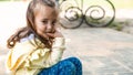 Sad little girl sitting alone Royalty Free Stock Photo