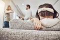 Sad little girl, sofa and parents in fight, conflict or disagreement in the living room at home. Family, divorce and Royalty Free Stock Photo