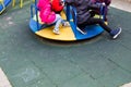 The sad little girlfriends in the playground during quarantine