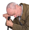 Sad lonely elderly man with a cane posing in studio Royalty Free Stock Photo