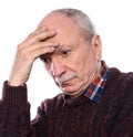 Sad lonely elderly man posing in studio on a white background Royalty Free Stock Photo