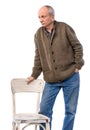Sad lonely elderly man posing in studio on a white background Royalty Free Stock Photo