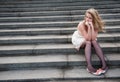 Sad lonely girl sitting Royalty Free Stock Photo