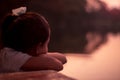 Sad lonely girl sitting and looking view alone as the fairy river Royalty Free Stock Photo