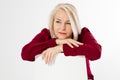 Sad lonely middle age woman. female depression, Portrait of a middle aged woman sitting in a chair and looking sad, Woman looks Royalty Free Stock Photo