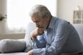 Sad lonely old man thinking on geriatric health problems Royalty Free Stock Photo