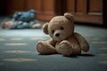 Sad lonely teddy bear lying on the floor symbol of abuse victims