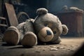 Sad lonely teddy bear lying on the floor symbol of abuse victims