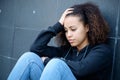 Sad and lonely teenager portrait in the city street Royalty Free Stock Photo