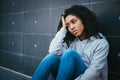 Sad and lonely teenager portrait in the city street Royalty Free Stock Photo