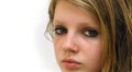 Sad look of grey teenage eyes Royalty Free Stock Photo