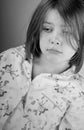 Sad Looking Child in Pyjamas Royalty Free Stock Photo