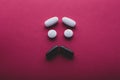 Sad face made of pills Royalty Free Stock Photo