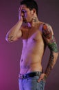 Sad male with tattoos Royalty Free Stock Photo