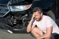 sad man driver at broken car after automobile collision car accident, car damage Royalty Free Stock Photo