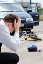 Sad man after hitting little biker Royalty Free Stock Photo