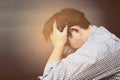 Sad man holding head with hand Royalty Free Stock Photo