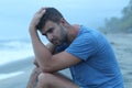 Sad man releasing anxiety at the beach Royalty Free Stock Photo