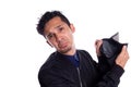 Sad man showing camera his empty wallet, Isolated on white background. Expression of Young adult frustrated because he