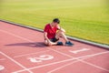 Sad man sitting and cry on the floor after losing