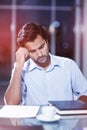 Sad man sitting at his desk Royalty Free Stock Photo