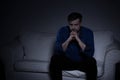 Sad man on the sofa Royalty Free Stock Photo