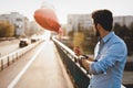 Sad man waiting for date on valentine date Royalty Free Stock Photo