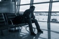 Sad man waiting for delayed flight Royalty Free Stock Photo