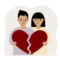 A sad man and woman are holding pieces of a broken red heart in their hands. Broken heart. Royalty Free Stock Photo