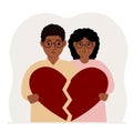 A sad man and woman are holding pieces of a broken red heart in their hands. Broken heart. Royalty Free Stock Photo