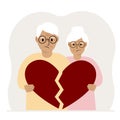 A sad man and woman are holding pieces of a broken red heart in their hands. Broken heart. Royalty Free Stock Photo