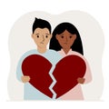 A sad man and woman are holding pieces of a broken red heart in their hands. Broken heart. Royalty Free Stock Photo